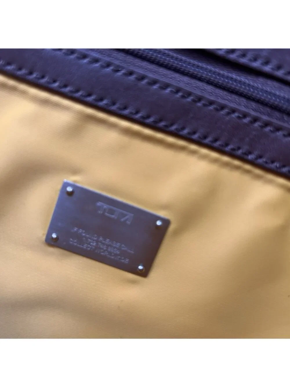 Tumi brown signature